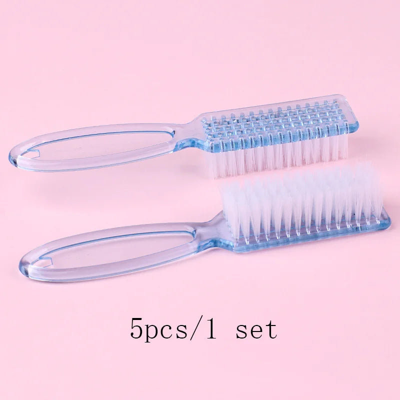 A set of five clear plastic nail art brushes with long handles displayed on a pink background.