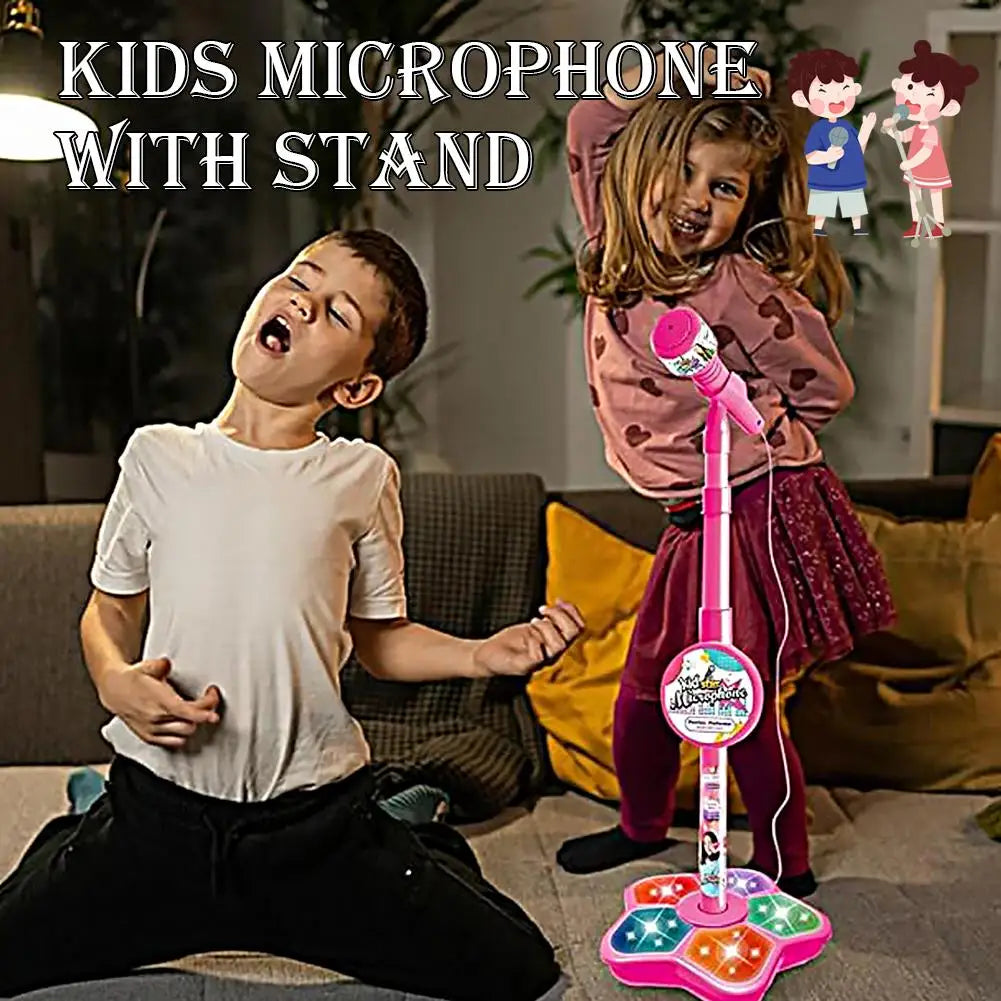 A young girl is holding a pink microphone with a stand and light effects.