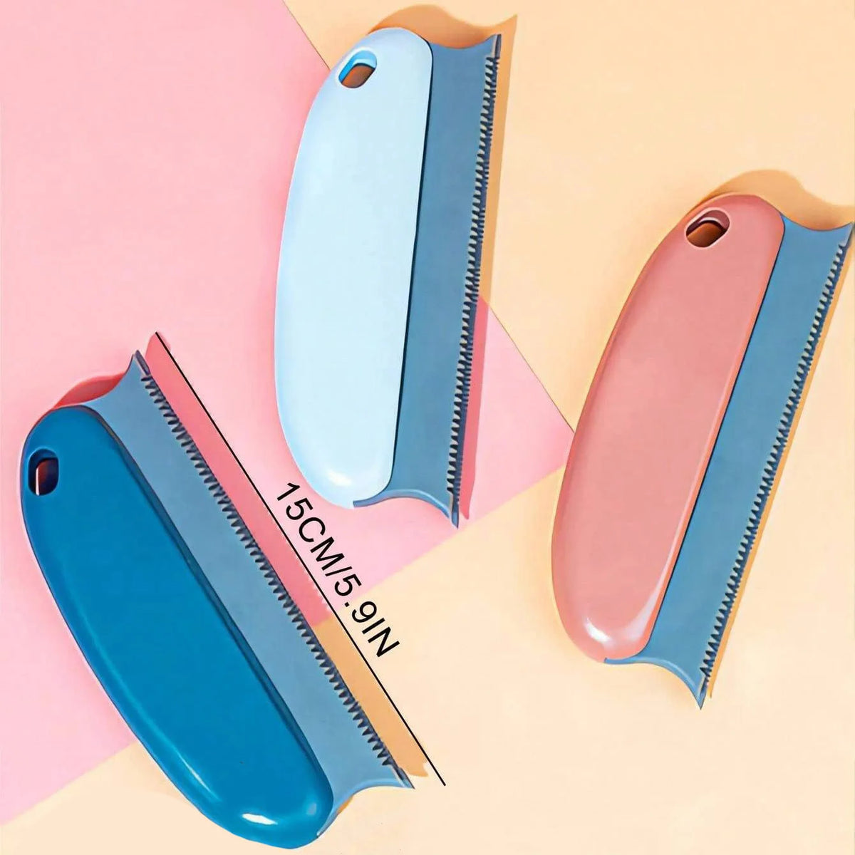 A set of three gentle pet hair removal brushes for cats and dogs in blue, pink, and teal colors.