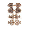 Vintage rotating sweater clips made of antique bronze or copper metal.