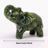 Hand-carved natural jade elephant statue in green