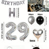 A kit for a happy birthday balloon garland featuring silver and black foil numbers and balloons.