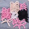 Assortment of pink, white, and black embroidered bow iron-on patches for DIY clothing decoration
