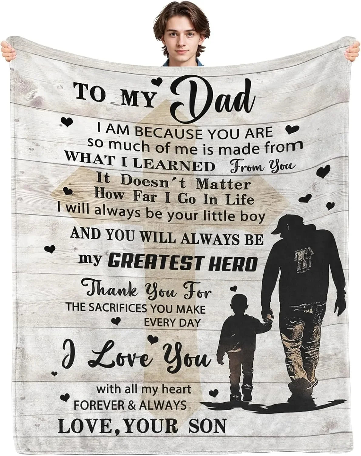 A personalized printed fleece throw blanket featuring text dedicated to a father and son.
