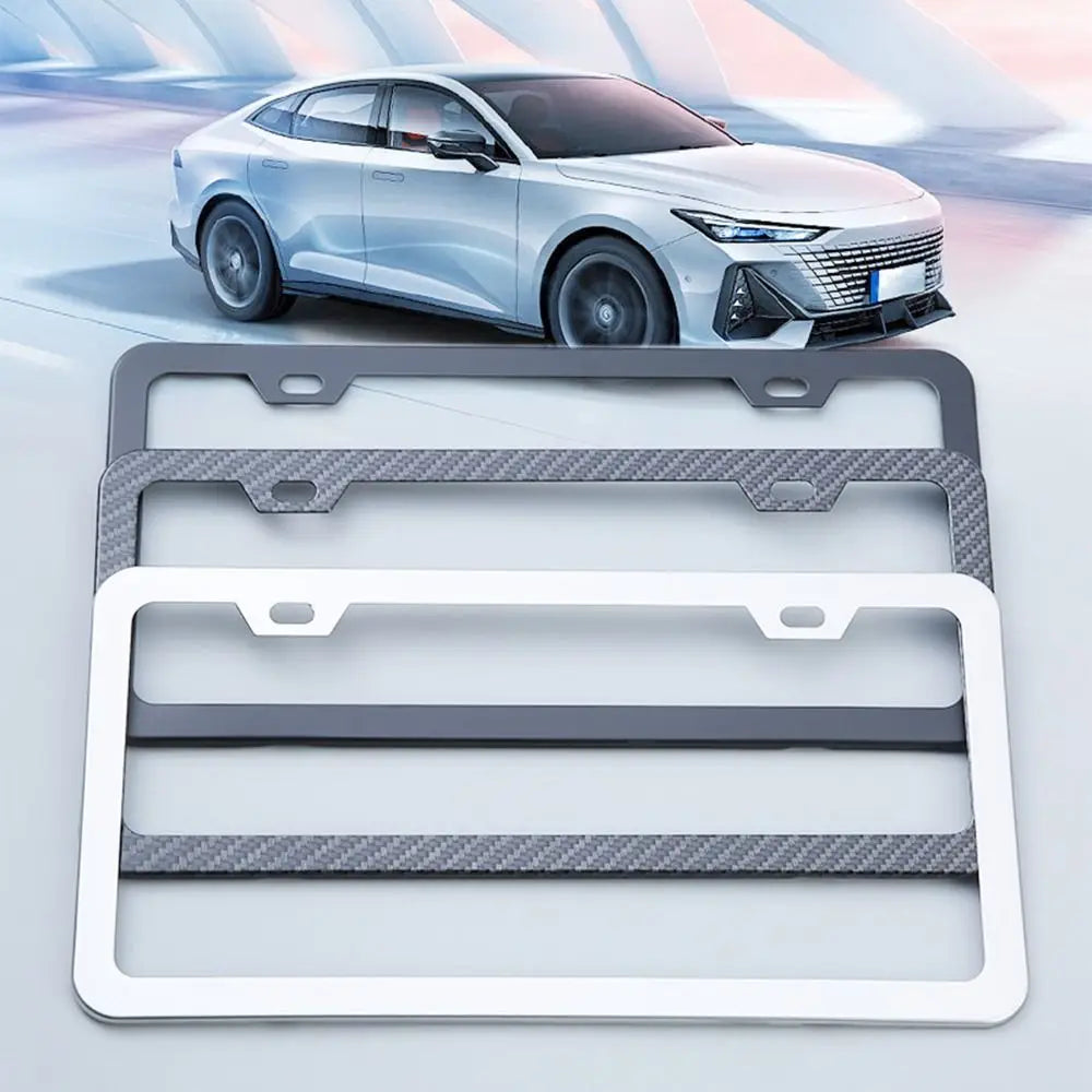 A set of two rustproof stainless steel license plate frames, one silver and one gray, displayed on a white background.