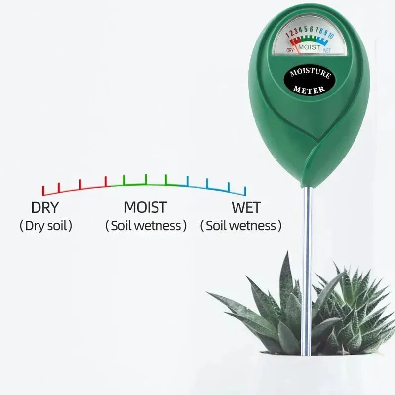 A green soil moisture meter with a needle indicating wetness, placed next to a plant.