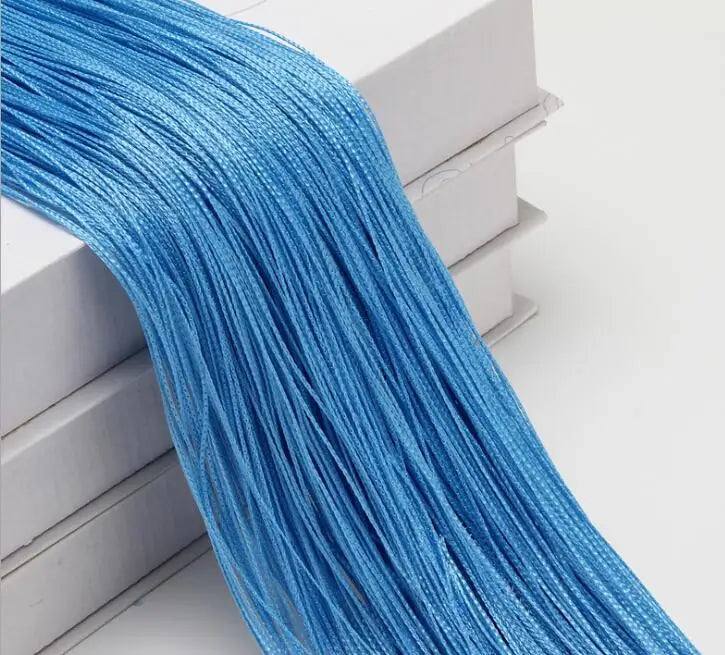 A bundle of bright blue beaded thread used for curtains or room dividers
