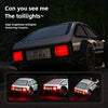A black classic car with bright red taillights is shown, alongside three versions of the RC drift car.
