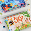 A colorful Busy Book for learning maths and alphabet, featuring various animals and objects.