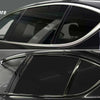 Before and after comparison of a glossy black vinyl wrap strip applied to a car window trim.