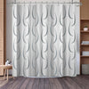 A white shower curtain featuring a gray geometric stripe pattern hanging from a metal rod.
