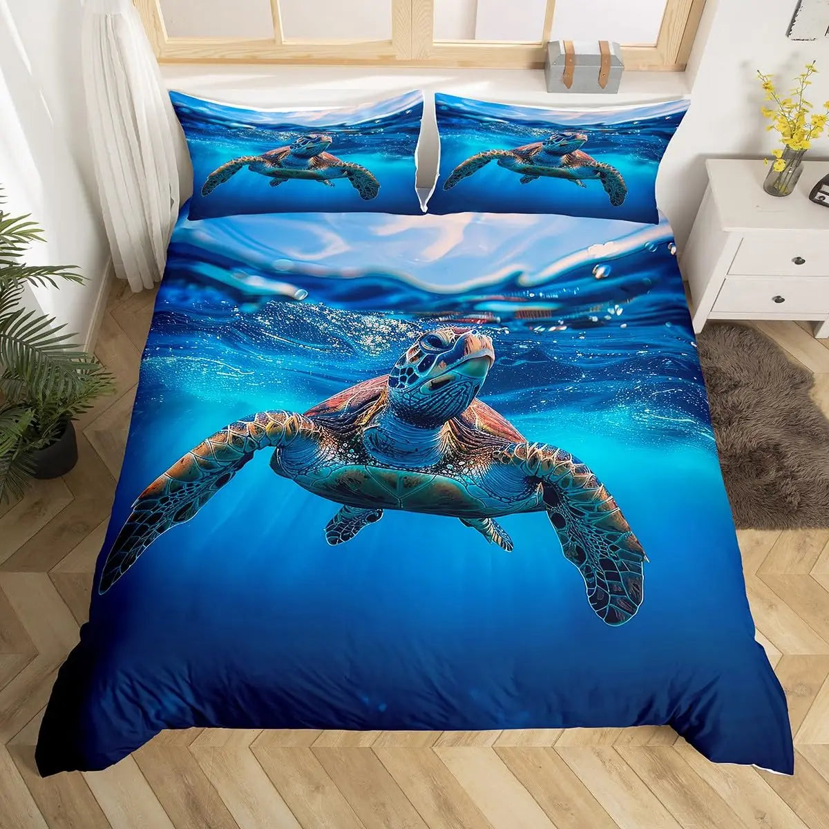 A blue sea turtle graphic printed on a duvet cover featuring an underwater scene.