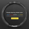 Black suede 3D printed steering wheel cover for Mazda models featuring a sports comfort design