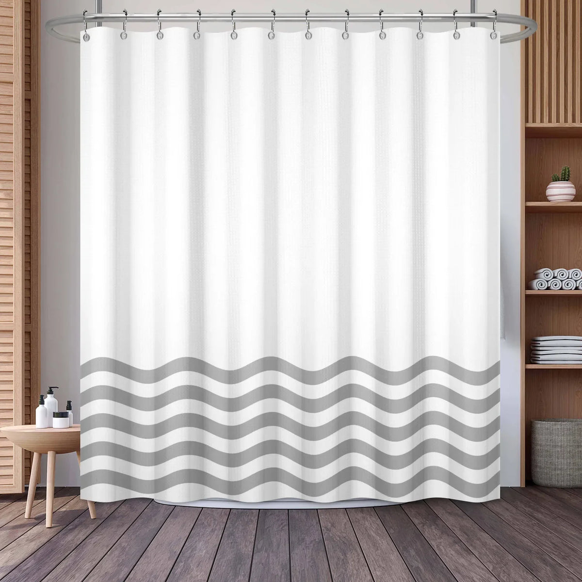White shower curtain featuring a gray wavy stripe pattern
