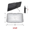 A black foldable windshield sunshade with a handle shown next to a silver version.