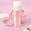 A pink breathable mesh crossbody water bottle carrier with a white bottle and box in the background.