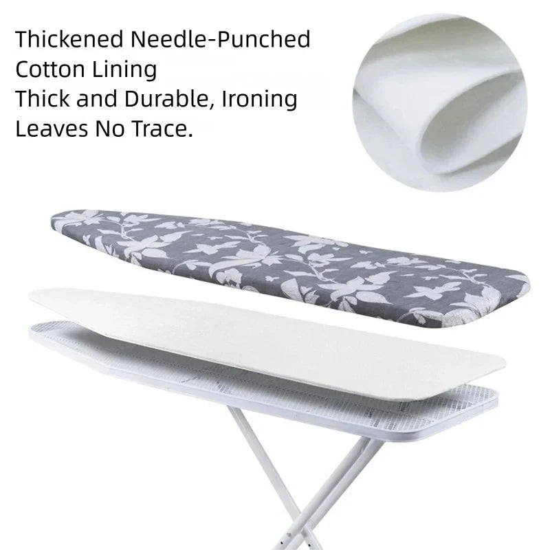 A gray patterned linen ironing board cover with a white pad is shown on an ironing board.