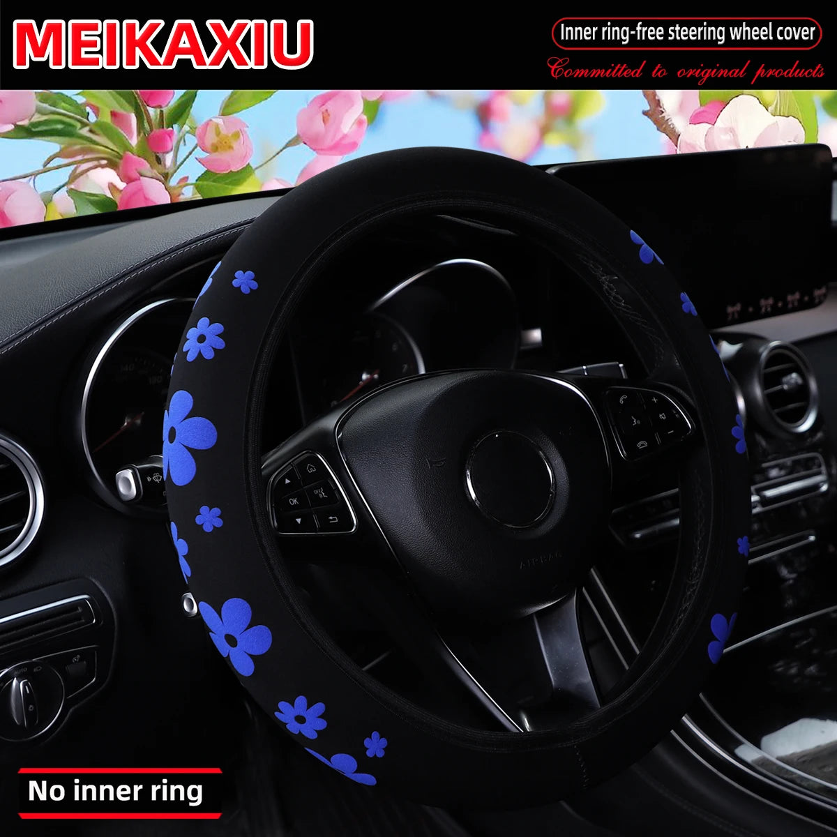 Black steering wheel cover with blue floral designs for a car, shown in a close-up view.