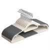 A plastic hanger with a rotating hook and anti-slip textured plastic for hanging clothes.