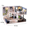 A detailed 3D wooden dollhouse miniature building kit featuring furniture and interior decor.