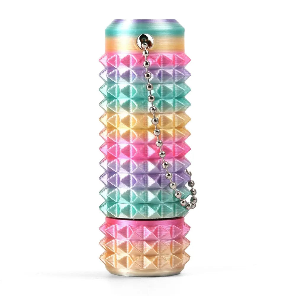 A stack of colorful spiky sensory fidget rollers in various shades of pink, purple, green, and yellow.