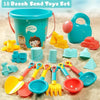 A colorful set of 18 beach and sand toys including a bucket, shovel, scoop, and various sand tools on a sandy surface.