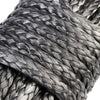 Close-up of a thick gray synthetic winch rope coiled and wrapped tightly.