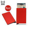 A red slim metal RFID blocking card holder with a pop-up design and a stack of cards.