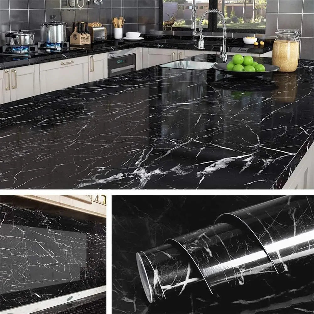 Close-up of black marble peel-and-stick film used as a kitchen backsplash.