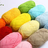 A collection of brightly colored soft 4-ply milk cotton yarn skeins in various shades including yellow, green, orange, pink, 