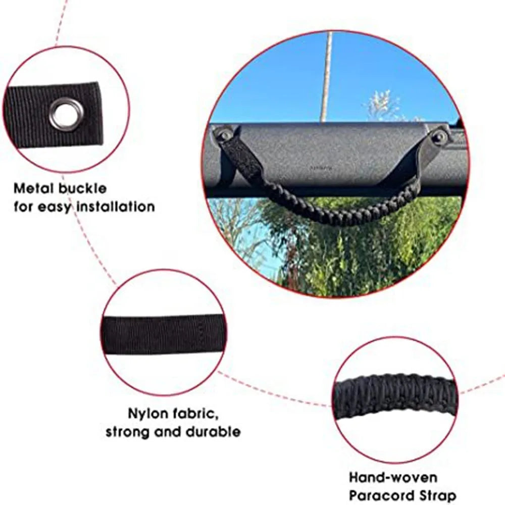 Close-up view of a black nylon fabric paracord strap with a metal buckle and hand-woven texture.