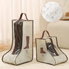 A pair of waterproof tall boot storage bags with transparent windows displayed on a light surface.