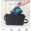 A dark blue foldable carry-on bag is shown being held by a hand, highlighting its easy folding and portable features.