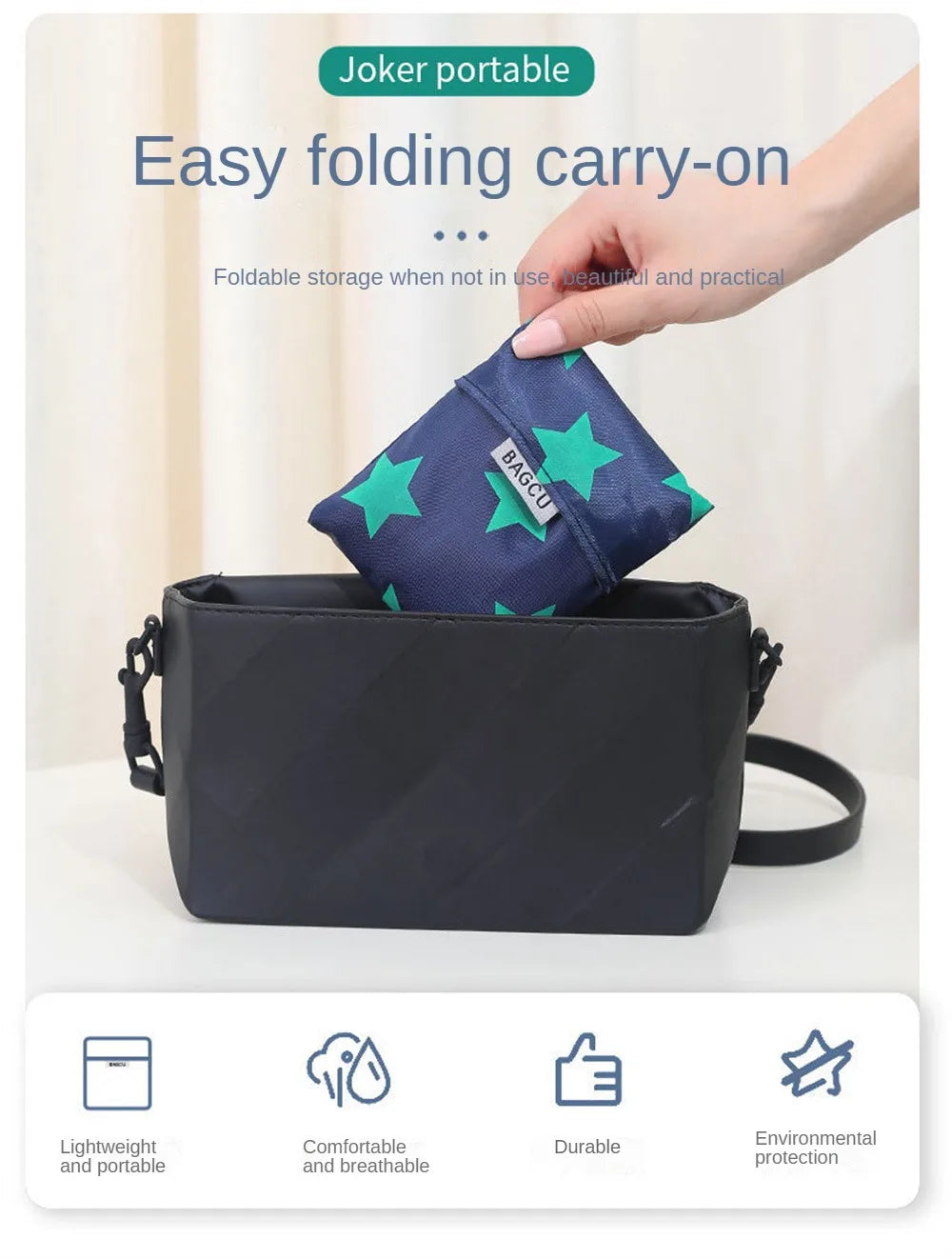 A dark blue foldable carry-on bag is shown being held by a hand, highlighting its easy folding and portable features.