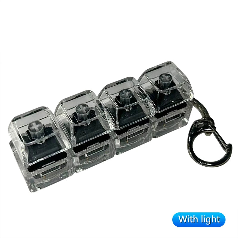 A set of clear acrylic LED mechanical keychain fidget toys with custom keycaps.