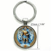 Silver key chain featuring a round medallion depicting the Saint Michael Archangel