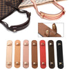 A collection of genuine leather handbag handle wraps and shoulder pads in various shades including brown, tan, pink, and blac