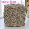A ball of metallic silver shimmer crochet yarn used for knitting and macrame