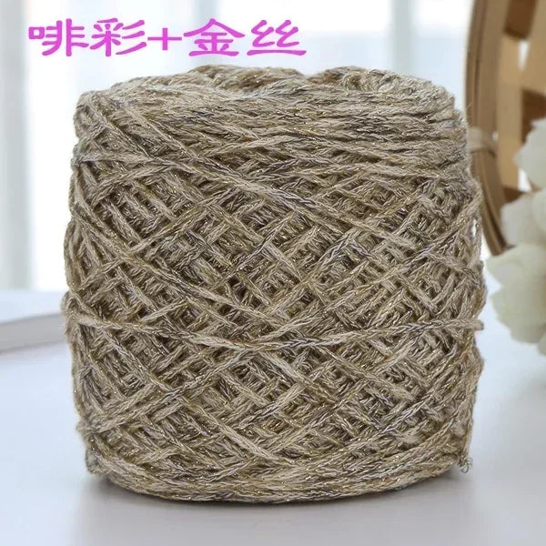 A ball of metallic silver shimmer crochet yarn used for knitting and macrame