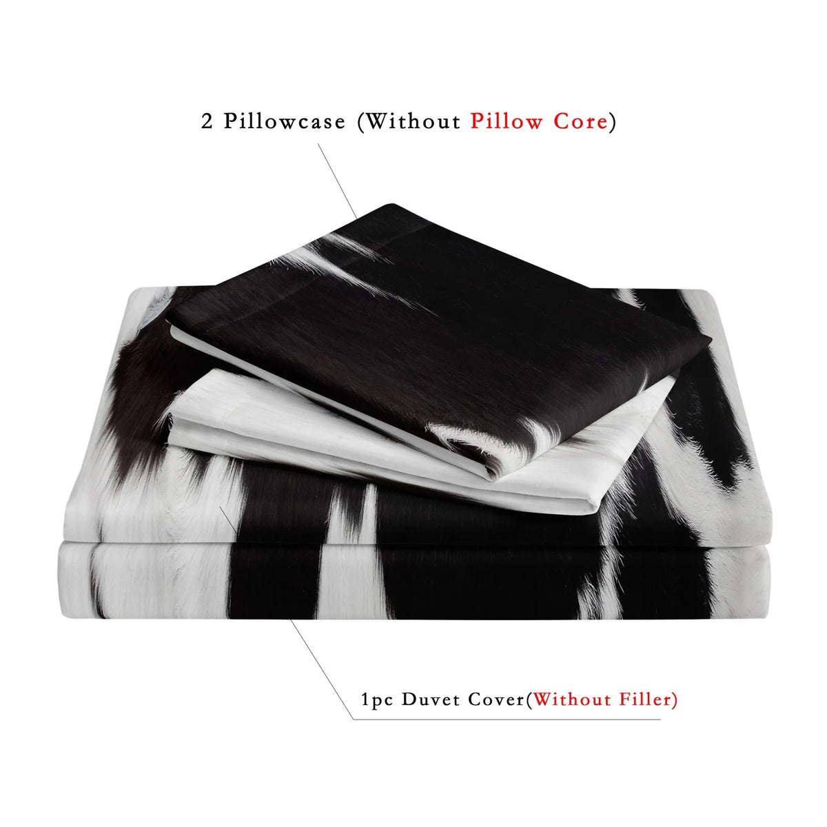 A set of black and white cow print duvet cover and two pillowcases shown folded on a surface.