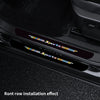 Close-up of a black car door showing installed sports decorative strips on the sill.