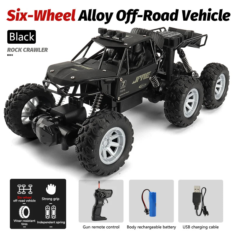Black six-wheel alloy off-road RC crawler vehicle with large tires and accessories