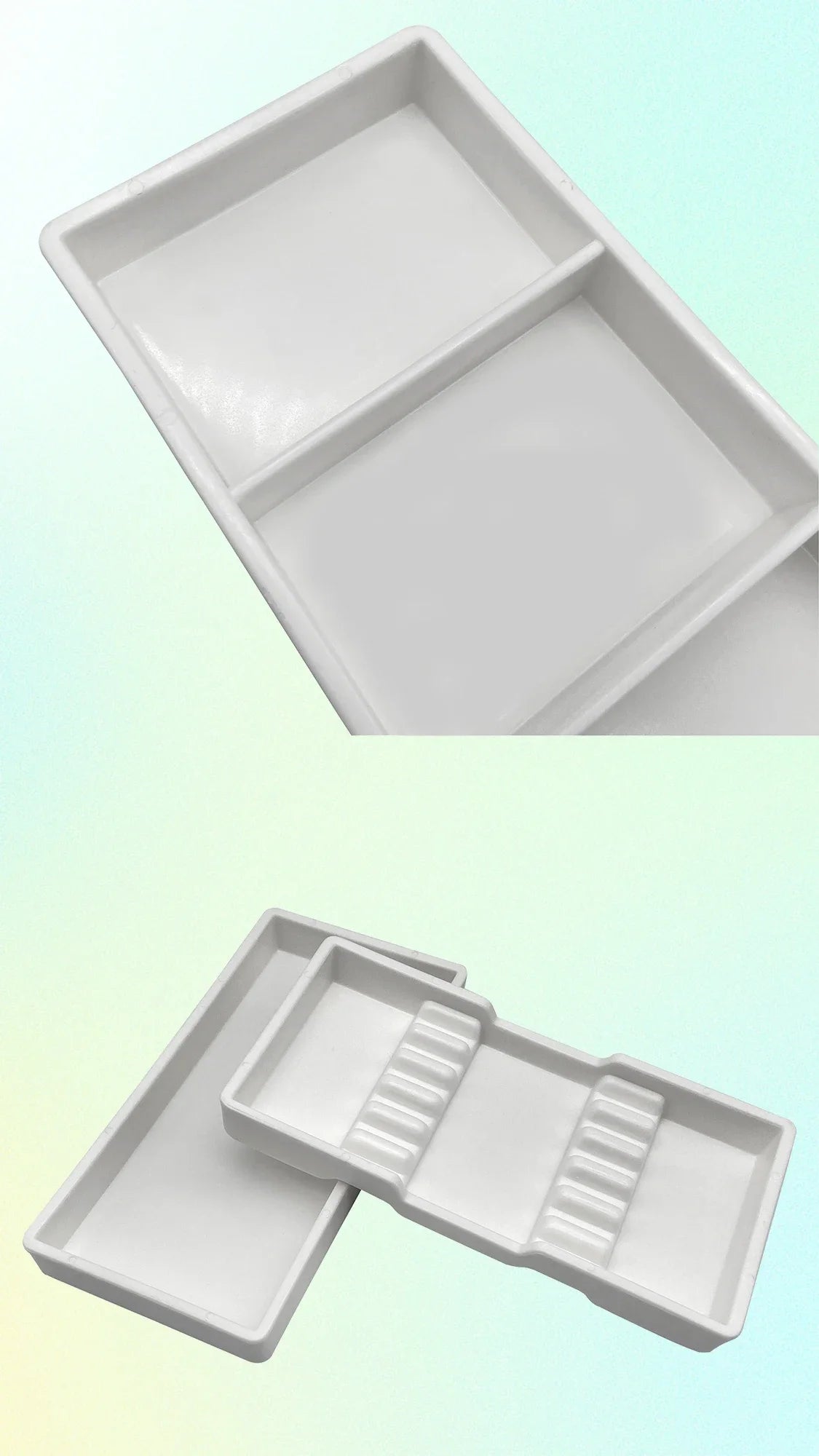 A white plastic drawer organizer tray with two compartments shown from an angled view.