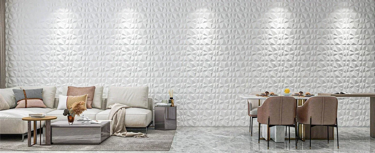 A modern interior featuring a white diamond pattern wall panel and a light sofa with neutral cushions.