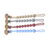 A set of food-grade silicone pacifier clips with anti-lost chains in various pastel colors.