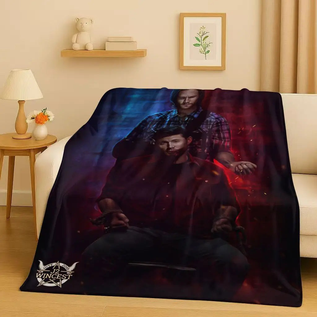 A dark themed blanket featuring a man in a plaid shirt and another figure, with the text 12 Wincest visible.