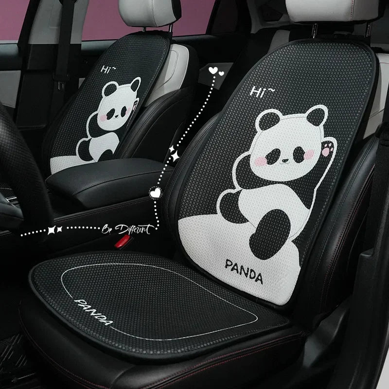 Black car seat covers featuring a panda design on the headrest and seat cushion.