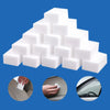 A stack of white melamine sponge cleaning erasers used for scrubbing and multi-purpose cleaning.