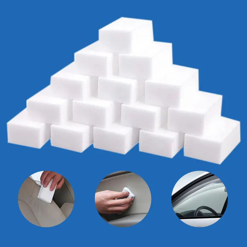 A stack of white melamine sponge cleaning erasers used for scrubbing and multi-purpose cleaning.
