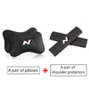 A pair of black PU leather car headrest pillows and shoulder protectors set